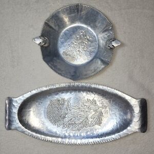 TRADE CONTINENTAL MARK, Set Of 2 Hand-Wrought Aluminum Pieces With Floral Design